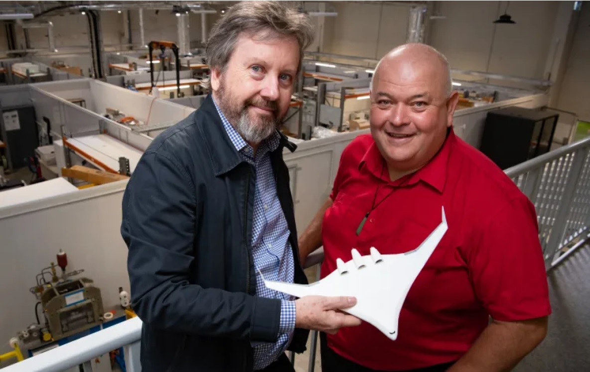 Grant Lumsden, left , and Prof Rod Badcock with a model of an electric aeroplane of the future.