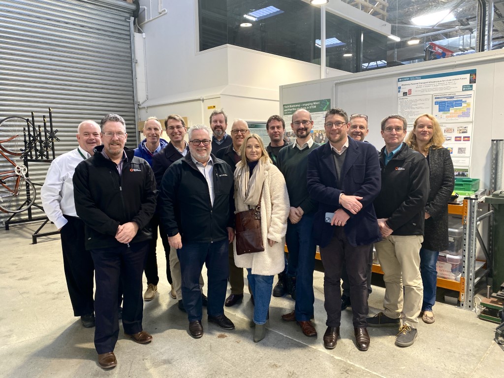 Group photo of Nova Systems visitors at Sydney Street.